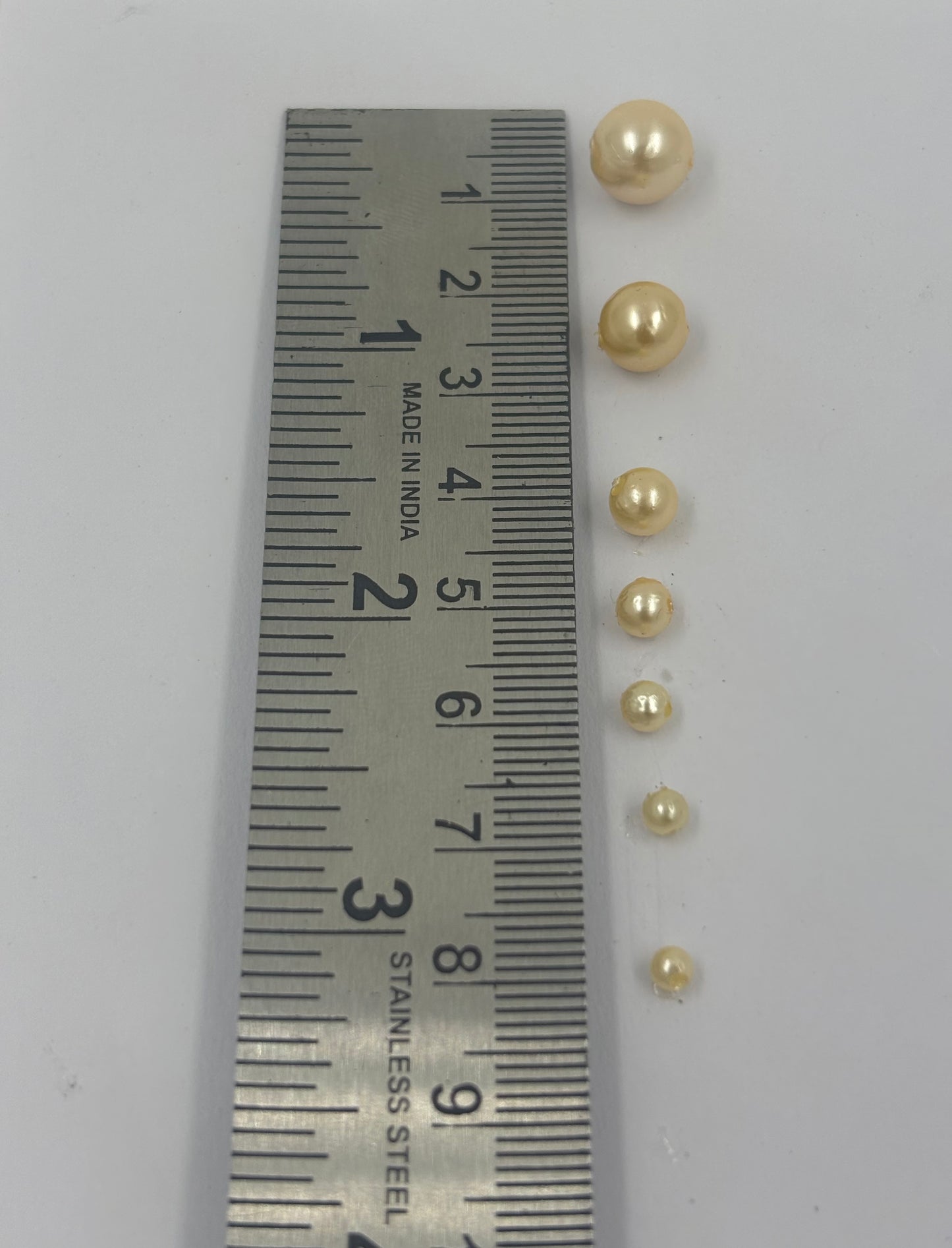 4mm golden shade moti (double coating)